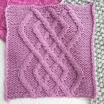 Красивый арановый узор спицами для пуловера, схема узора